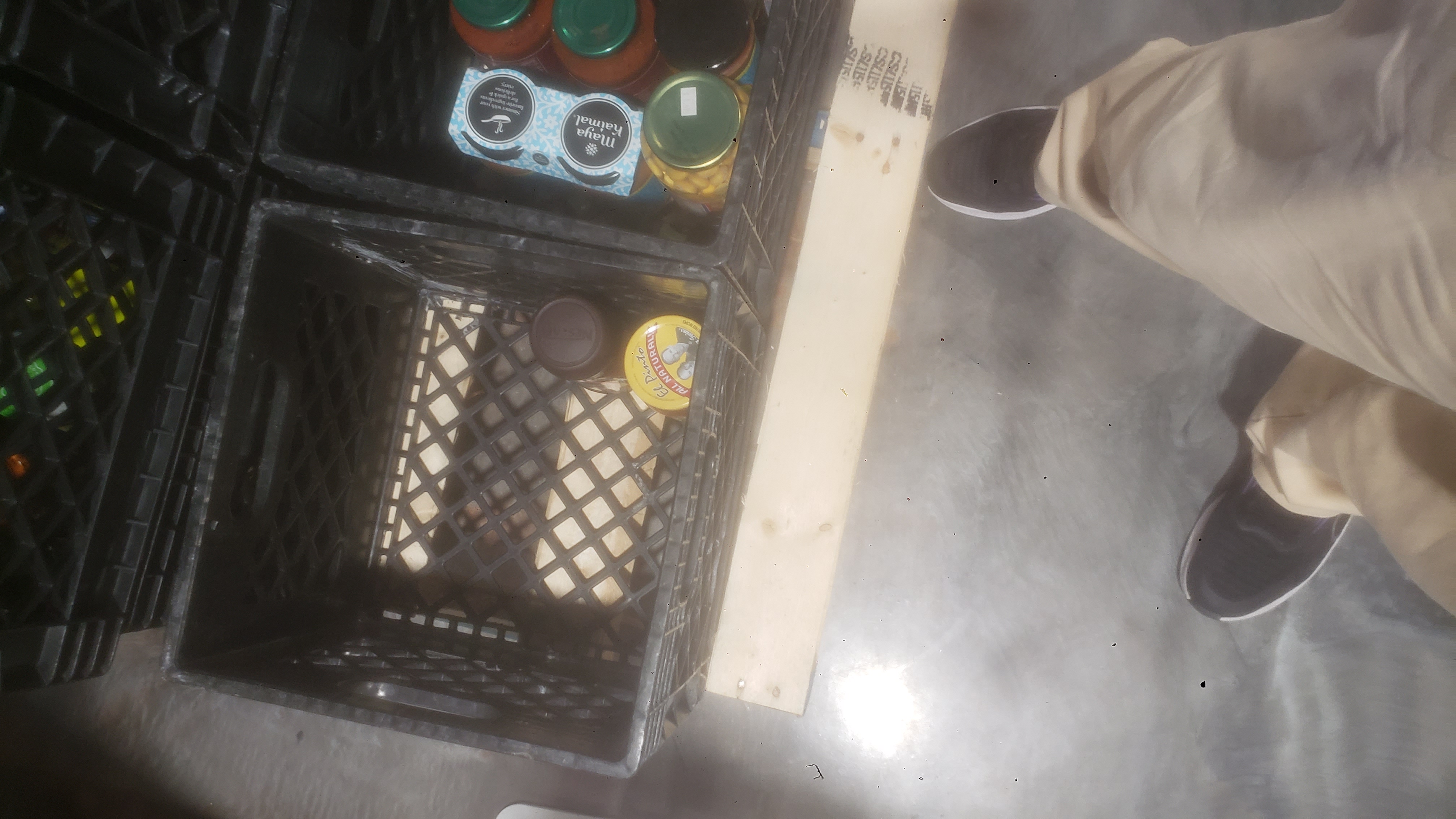 Glass jars in crates.